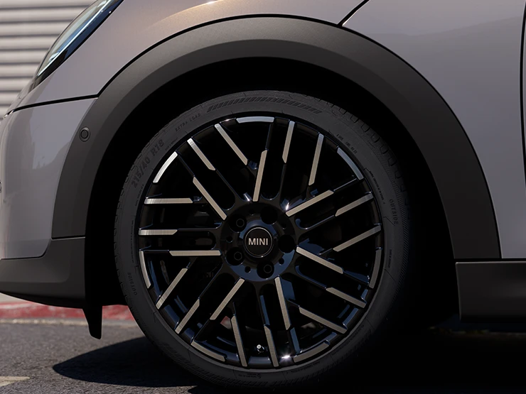 Detail view of the MINI Cooper Convertible in Copper Grey with Night Flash Spoke 2-Tone Rims.