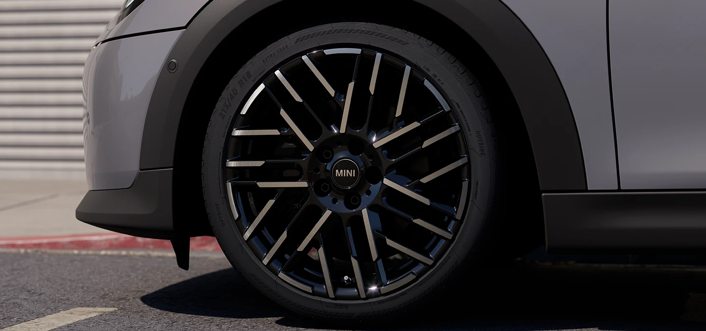 Detail view of the MINI Cooper Convertible in Copper Grey with Night Flash Spoke 2-Tone Rims.