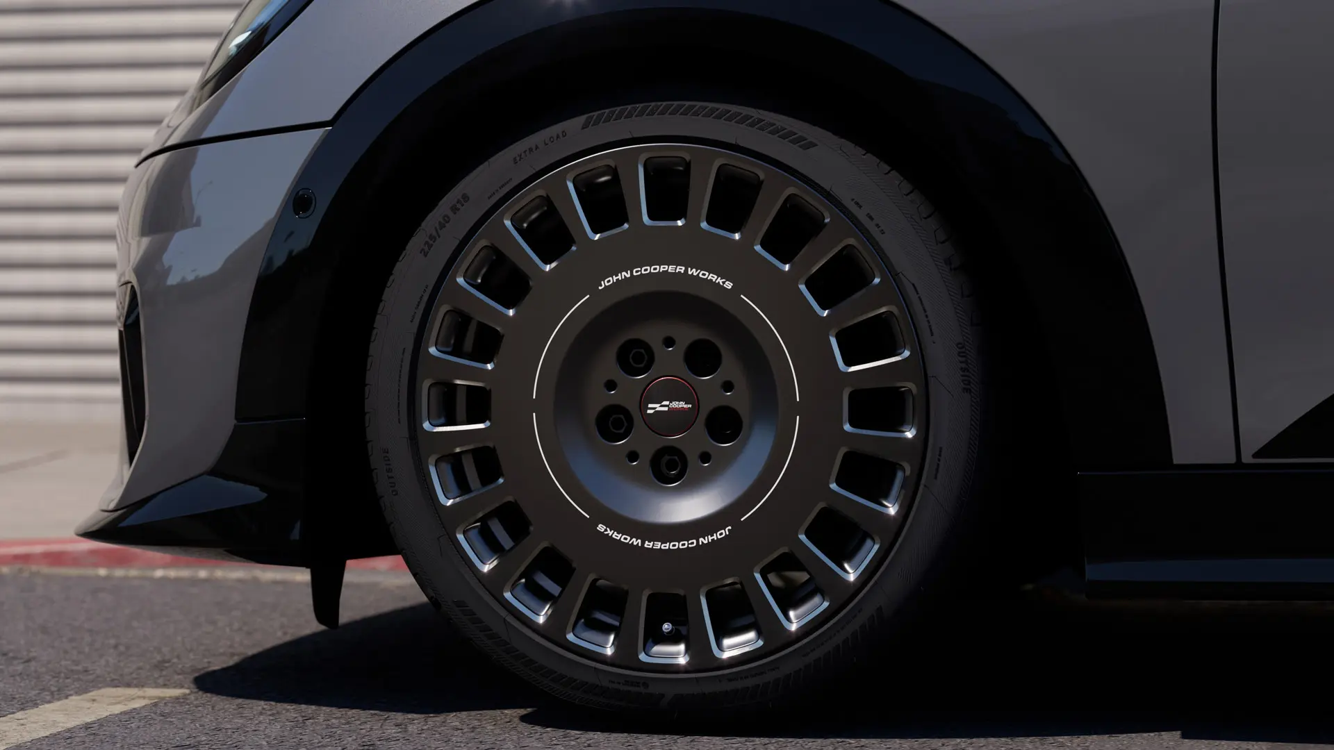 Close-up view of the diamond-milled detail on the Frozen Midnight Grey MINI JCW 18" Rallye Spoke 964 wheel. 