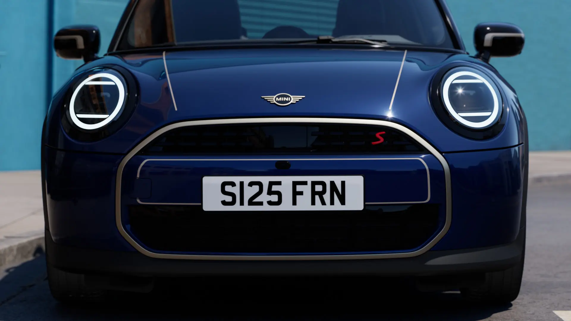Front view of MINI Convertible in Blue with MINI Favoured bonnet decals in Silver.