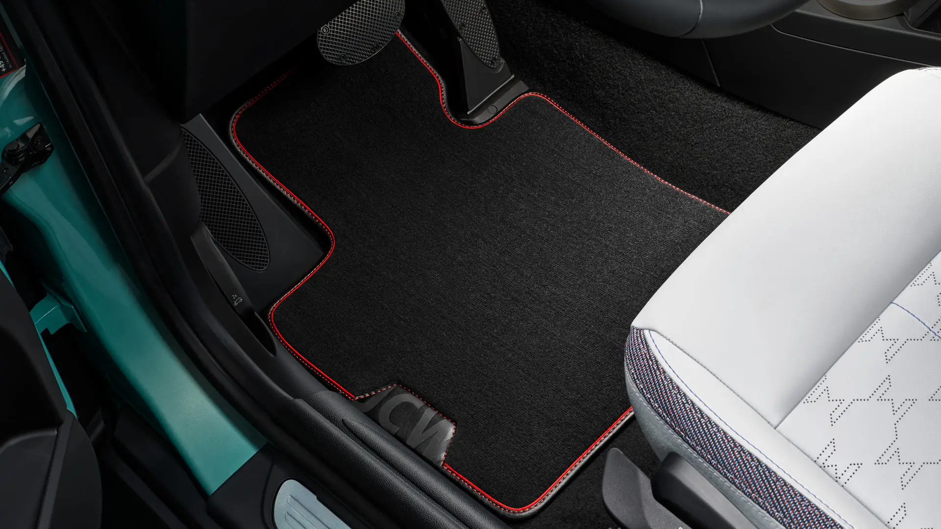 MINI John Cooper Works textile floor mat in footwell. 