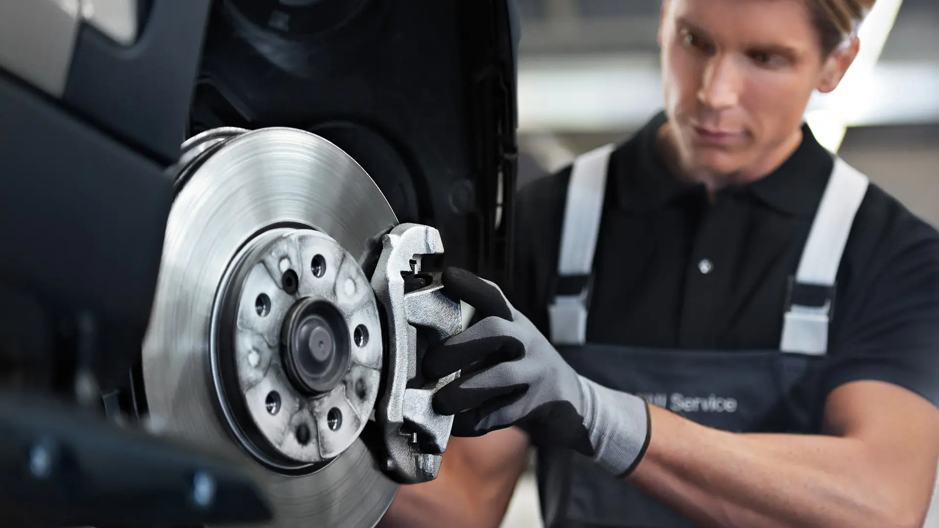 MINI employee checking brakes