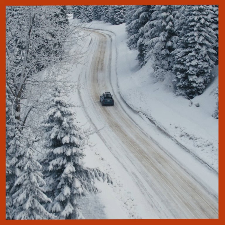 A GIF of the MINI Countryman ALL4 driving through the snowy landscape of British Columbia, Canada. 