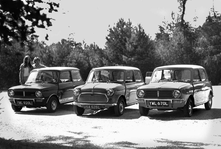 Black and white image with three cars: A Mini and two Mini Clubman vehicles.